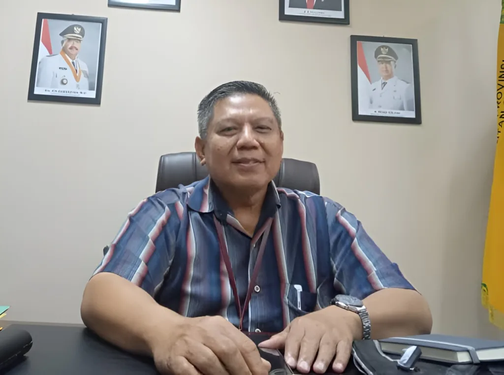 Foto : Kepala Disdukcapil Kukar, Muhammad Iryanto (Istimewa)